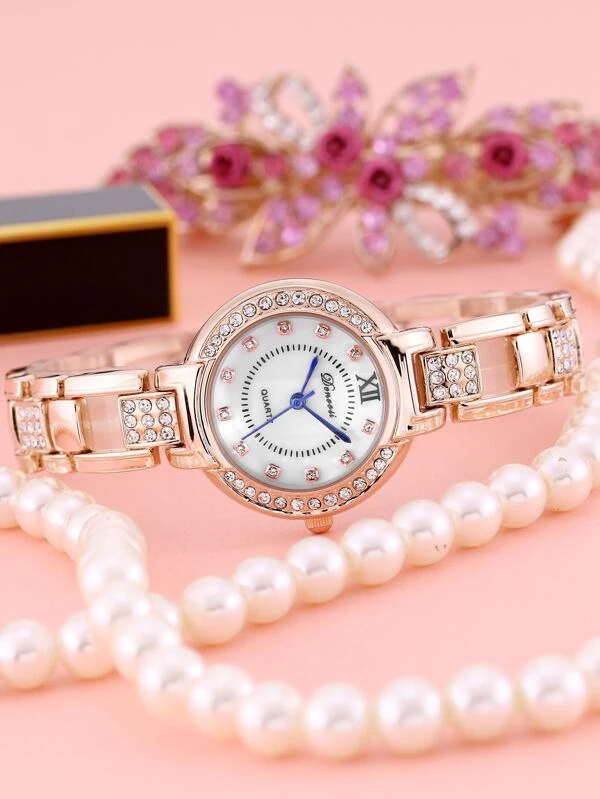 นาฬิกาควอตซ์ ตกแต่ง พลอยเทียม 1 ชิ้น  น-73